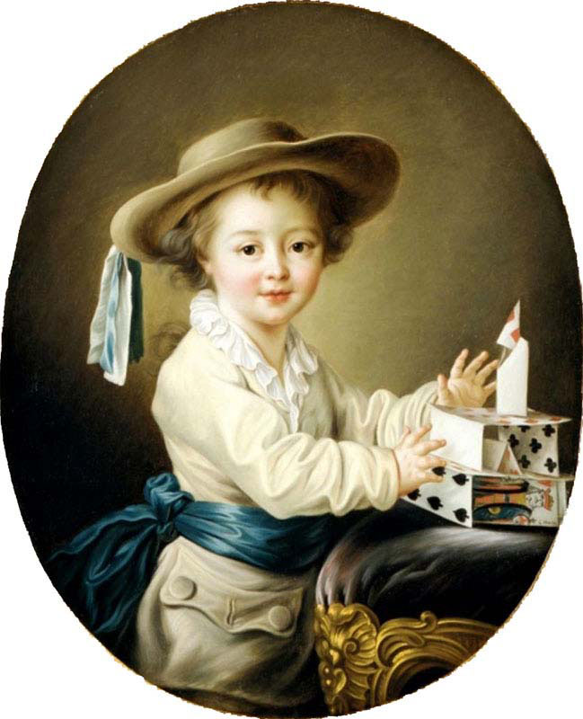 boy with a house of cards